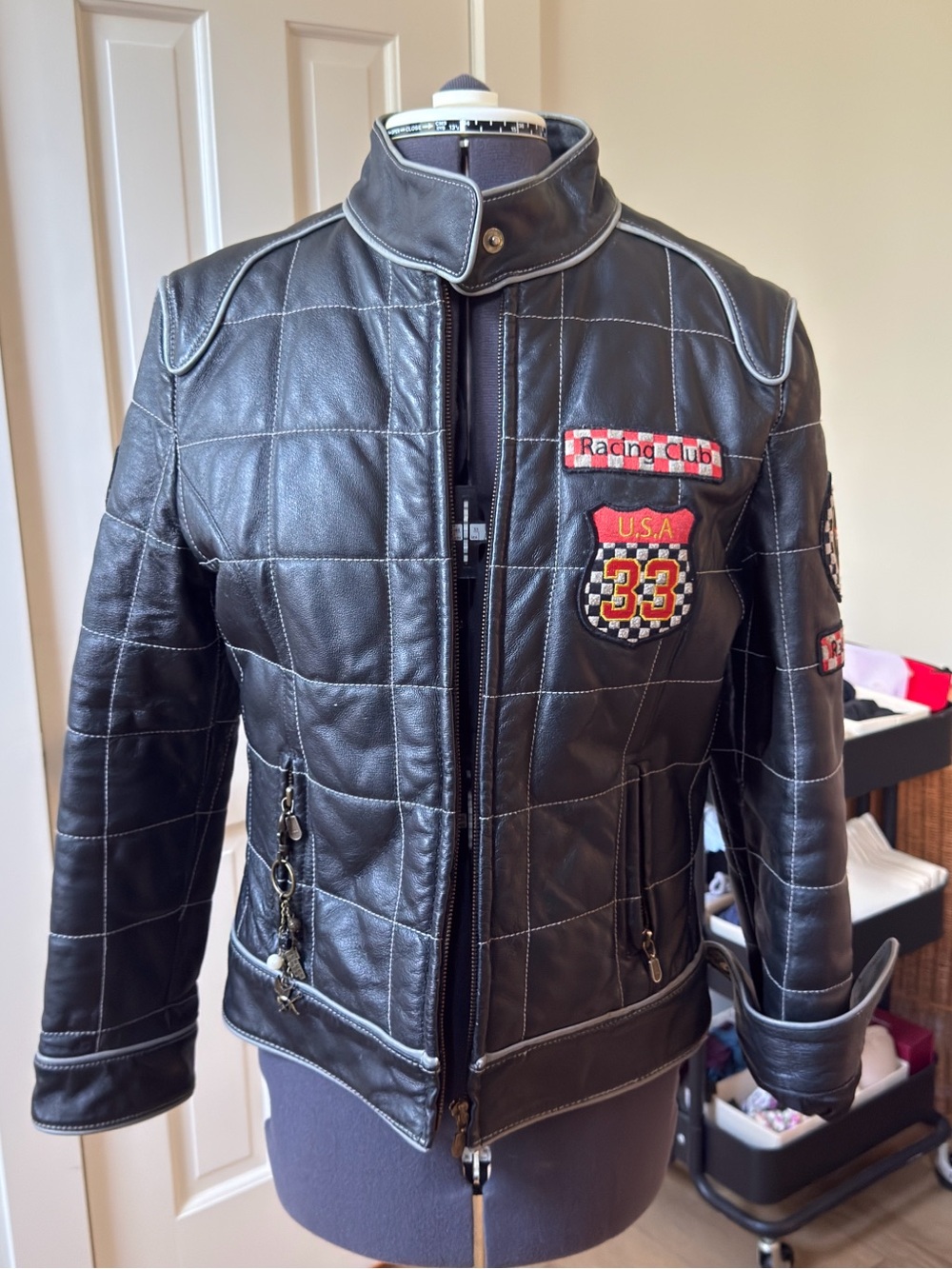 Black Quilted Leather Racing Jacket with Patch Accents